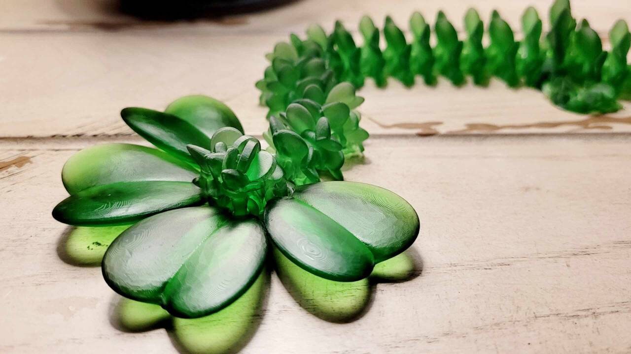 3D resin printed lucky clover dragon fidget toy.