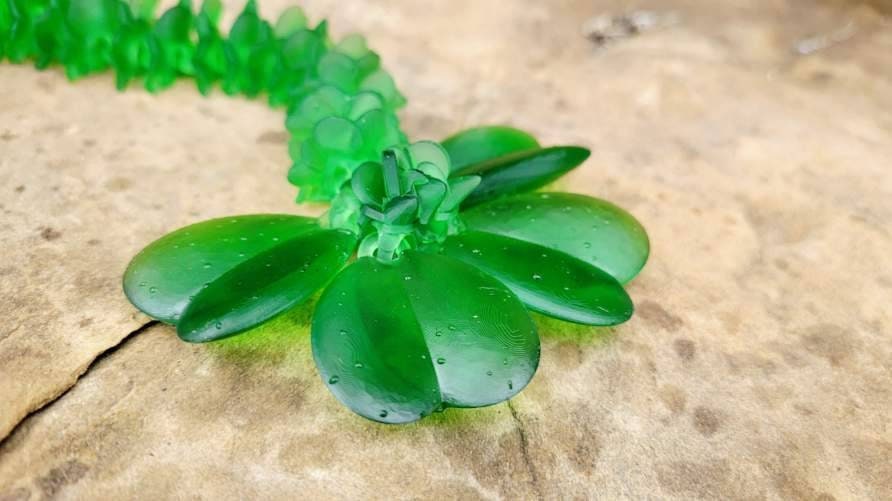 3D resin printed lucky clover dragon fidget toy.