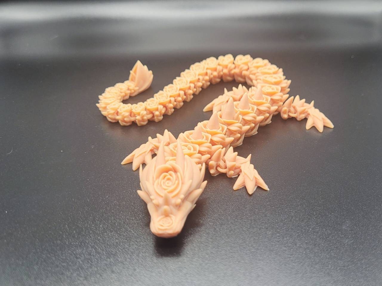 3D resin printed rose dragon fidget toy.