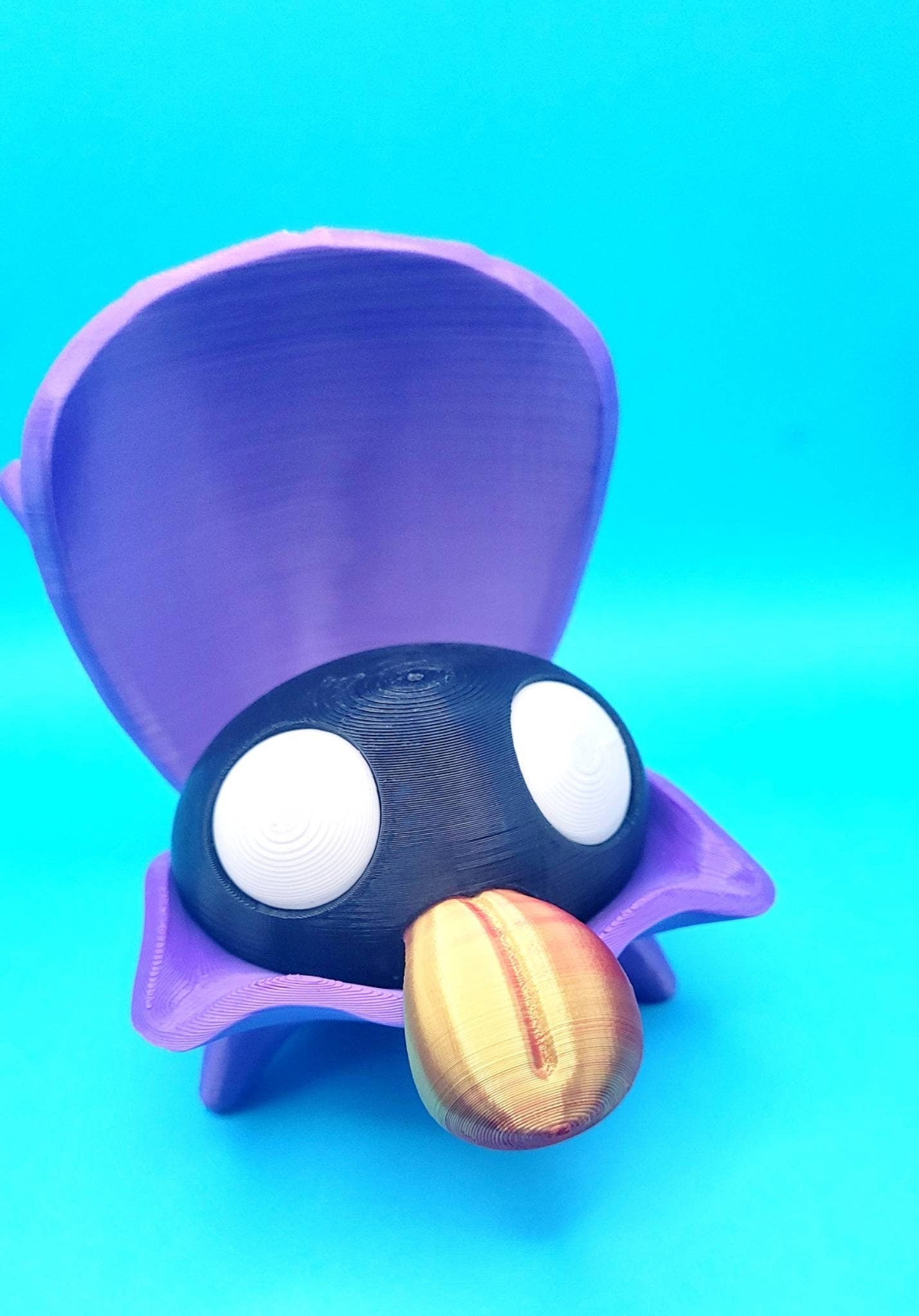 3D printed pokemon: Shellder with articulated shell.