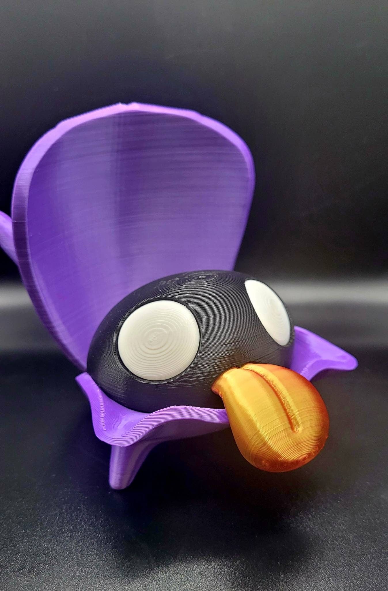 3D printed pokemon: Shellder with articulated shell.