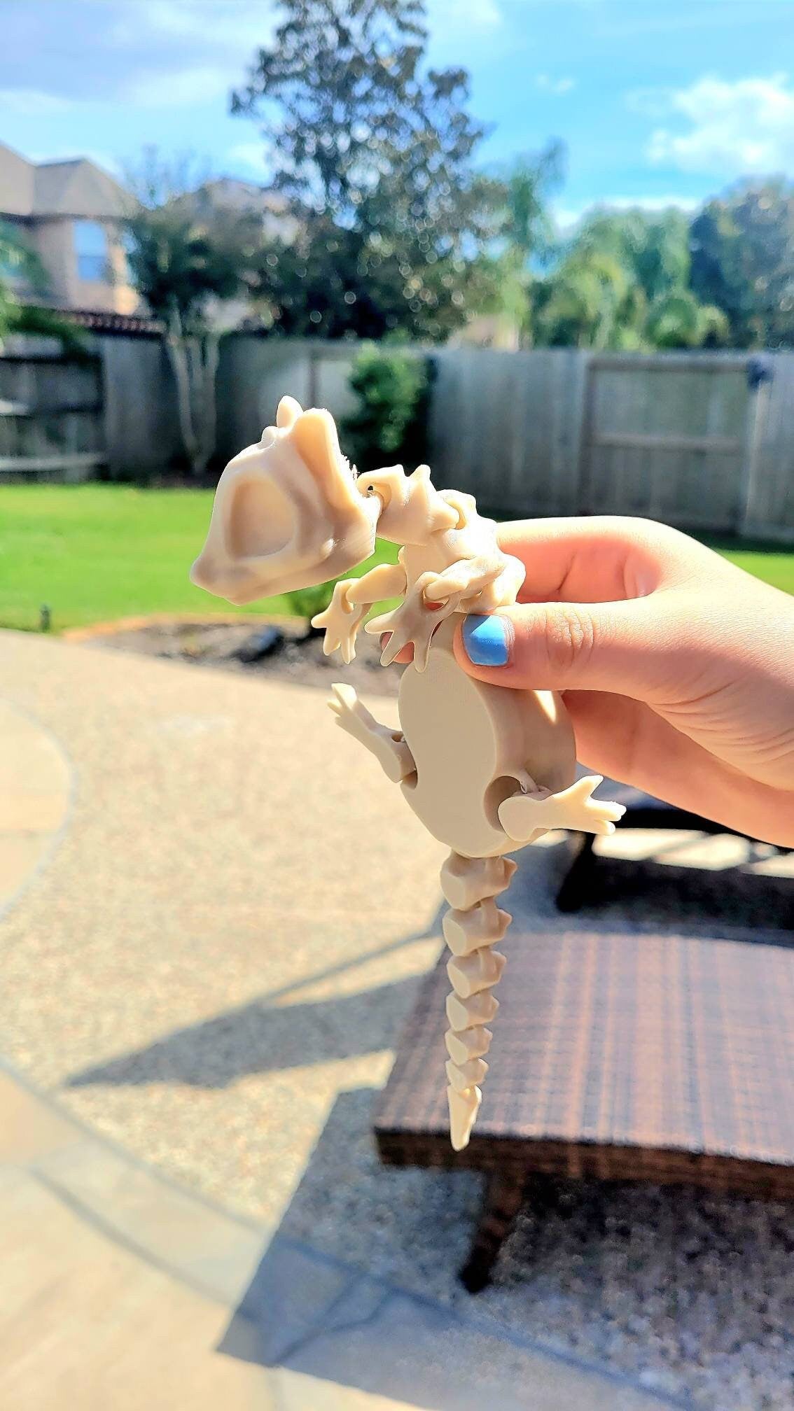 3D printed bone rat, articulated fidget toy.