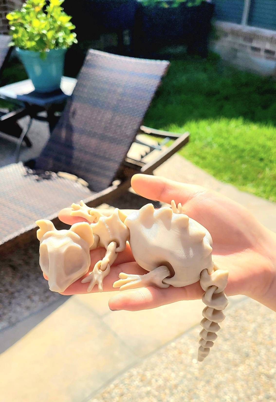 3D printed bone rat, articulated fidget toy.