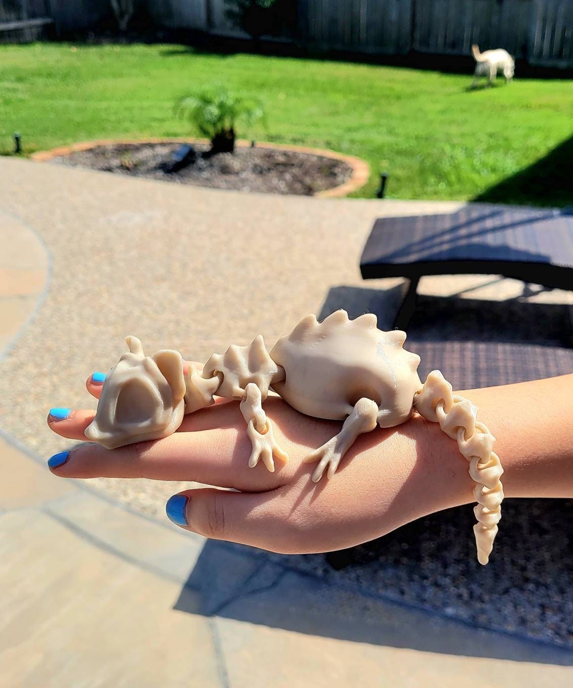 3D printed bone rat, articulated fidget toy.