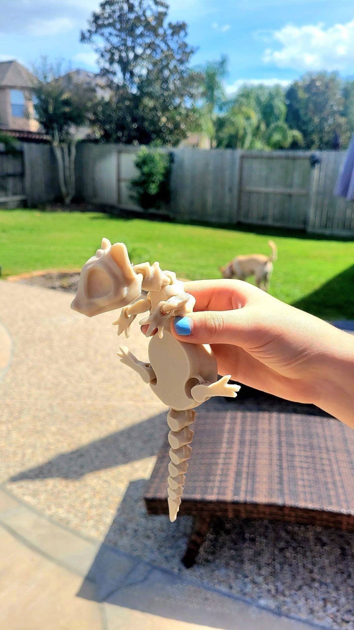 3D printed bone rat, articulated fidget toy.