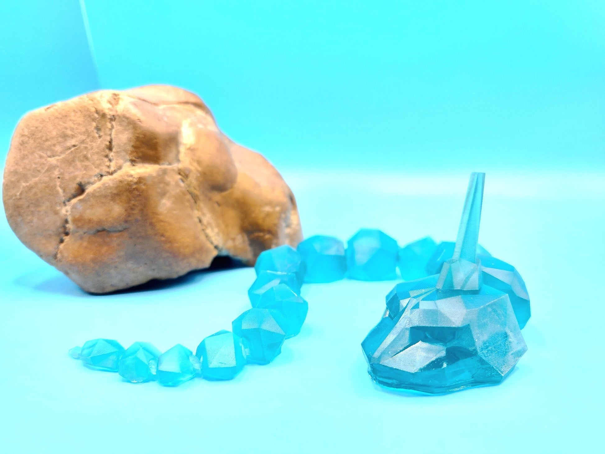 3D resin printed articulate crystal onix. Fidget toy.