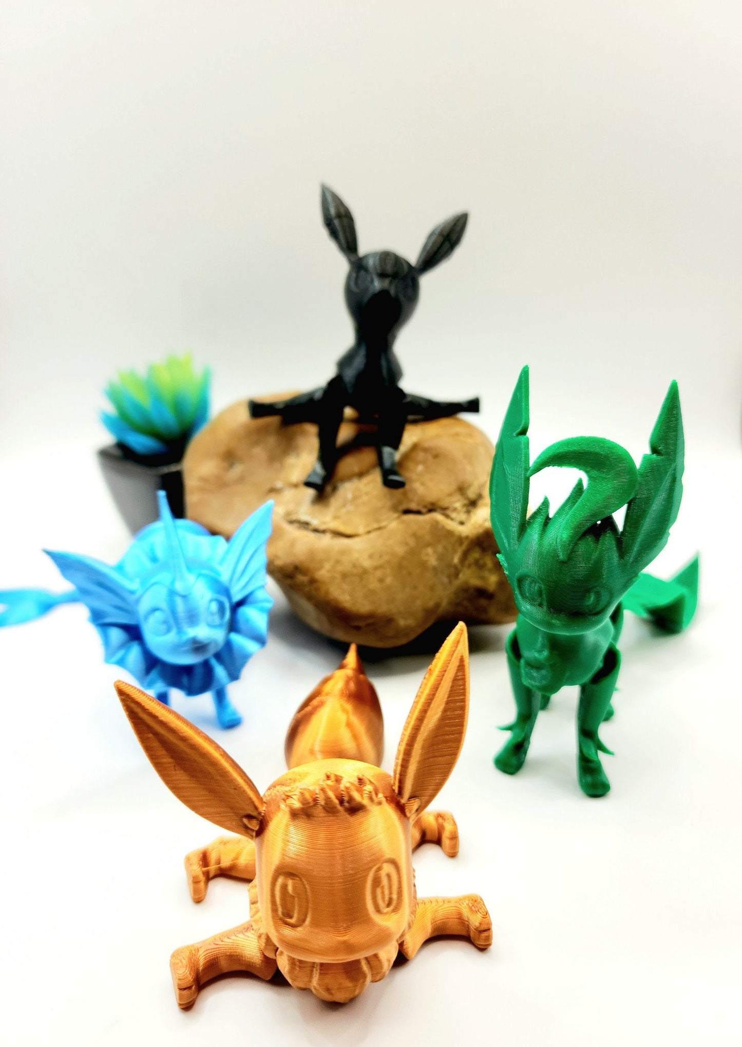 3D printed eeveelution series. Articulated, fidget toy.