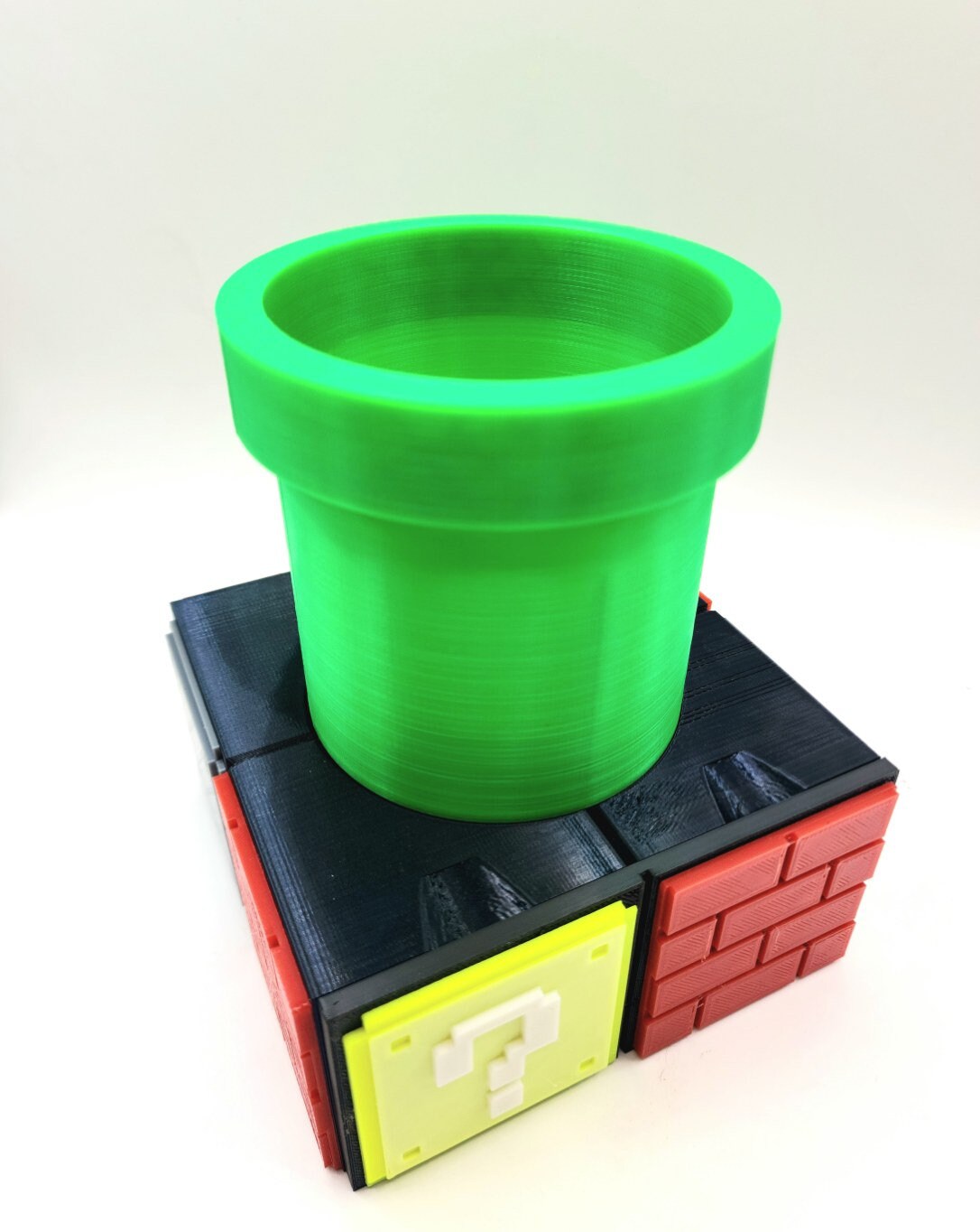 3D printed Super Mario inspired memory card organizer, drawer, pencil holder.