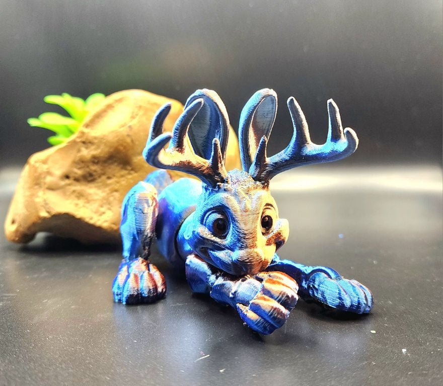 3D printed Jackalope articulate fidget sensory desktop toy.