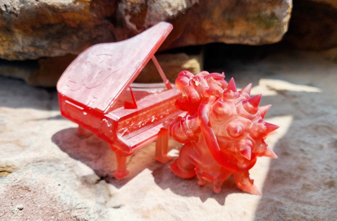 Resin printed Bowser playing Piano from Super Mario Brothers movie. Fan art, now include Princess Peach.