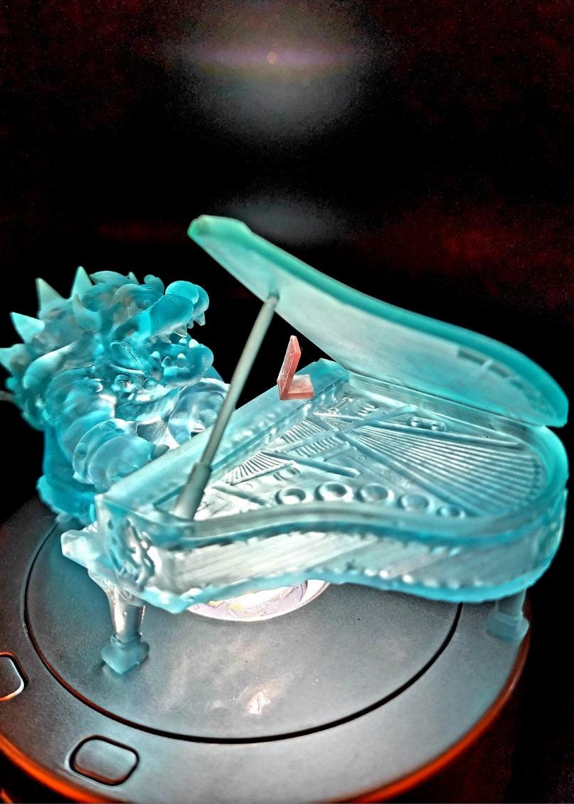 Resin printed Bowser playing Piano from Super Mario Brothers movie. Fan art, now include Princess Peach.