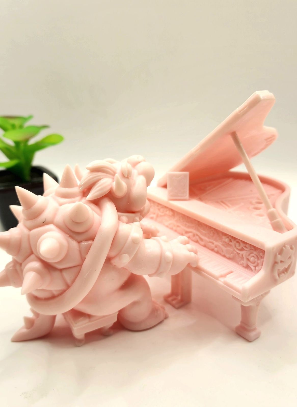 Resin printed Bowser playing Piano from Super Mario Brothers movie. Fan art, now include Princess Peach.