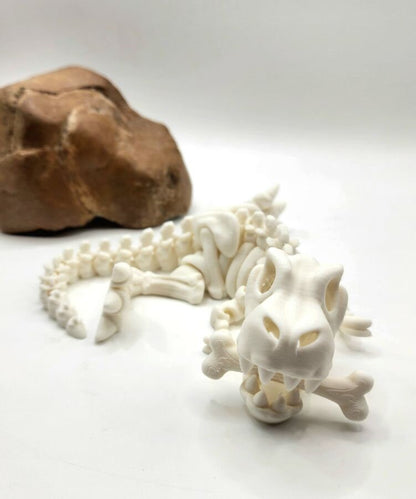 3D printed articulate skeletal T Rex fidget, sensory toy.