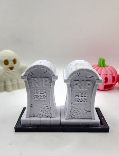 3D printed tombstone salt and pepper shakers.