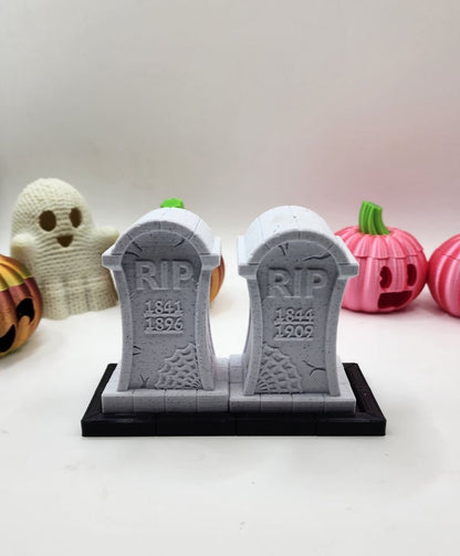 3D printed tombstone salt and pepper shakers.