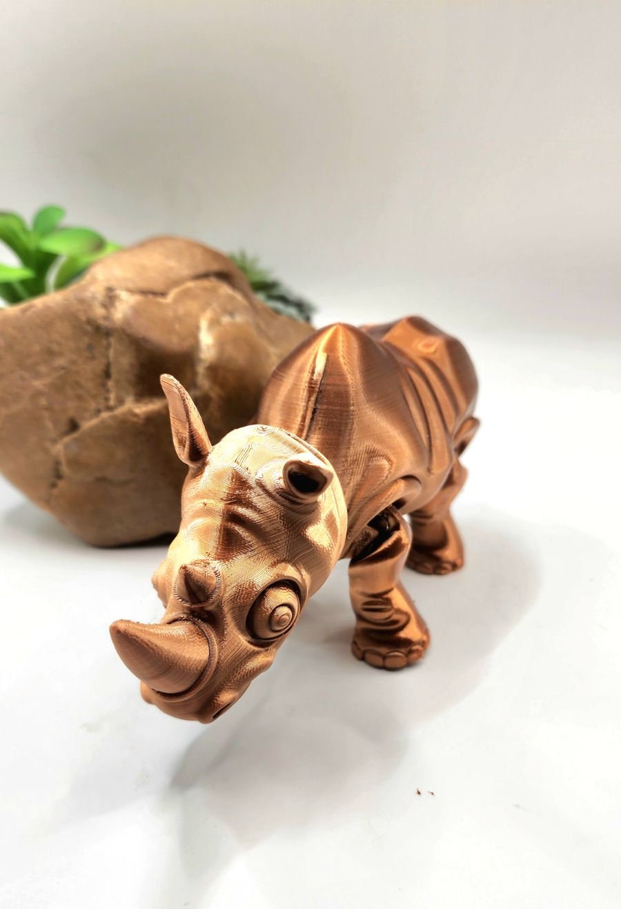 3D printed flexi rhino. Articulated, fidget toy.