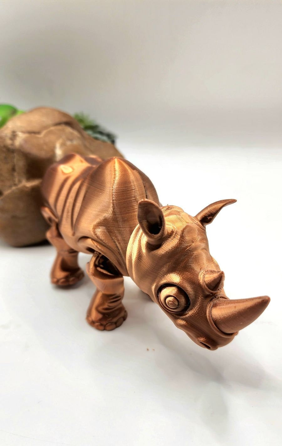 3D printed flexi rhino. Articulated, fidget toy.