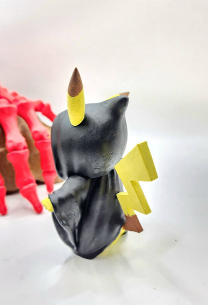 3D resin printed Pikachu cosplay as ghost face with knife. Halloween decoration.