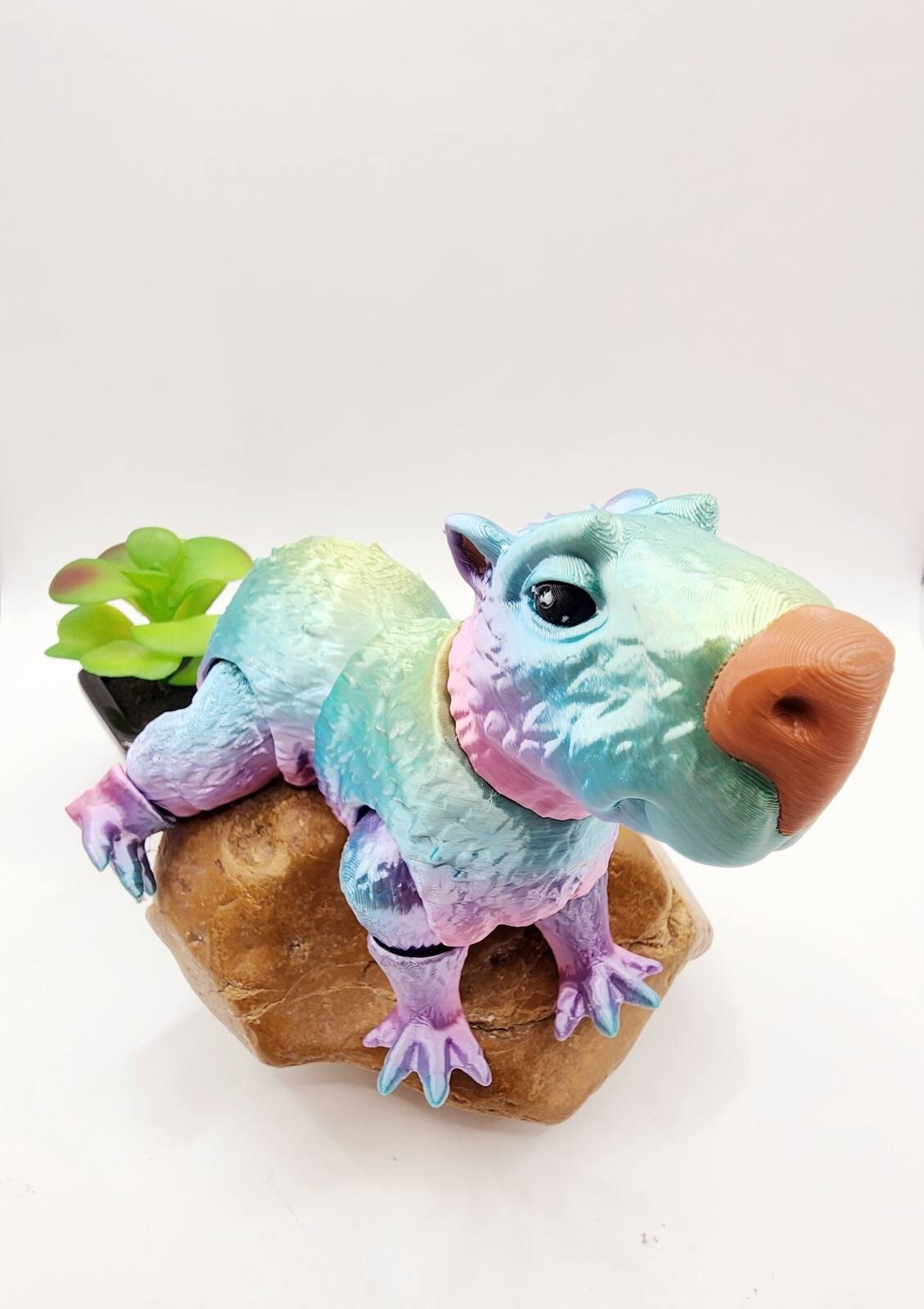 Capybara 3D multicolor printed articulate fidget toy.