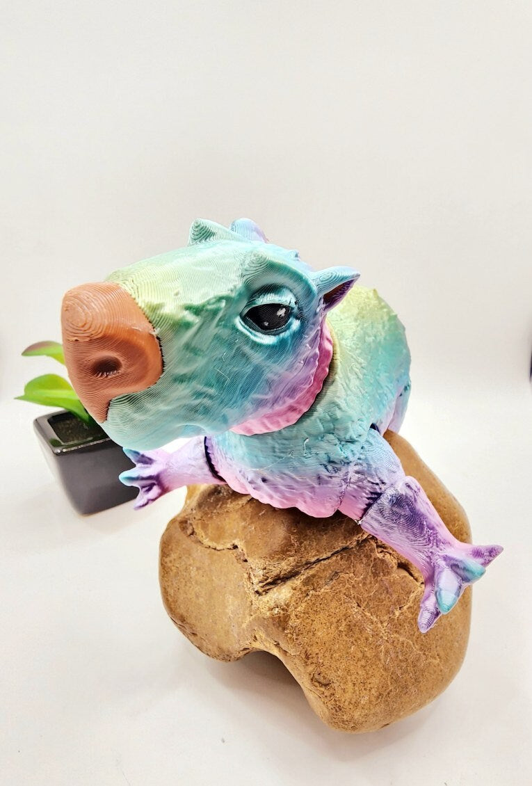 Capybara 3D multicolor printed articulate fidget toy.