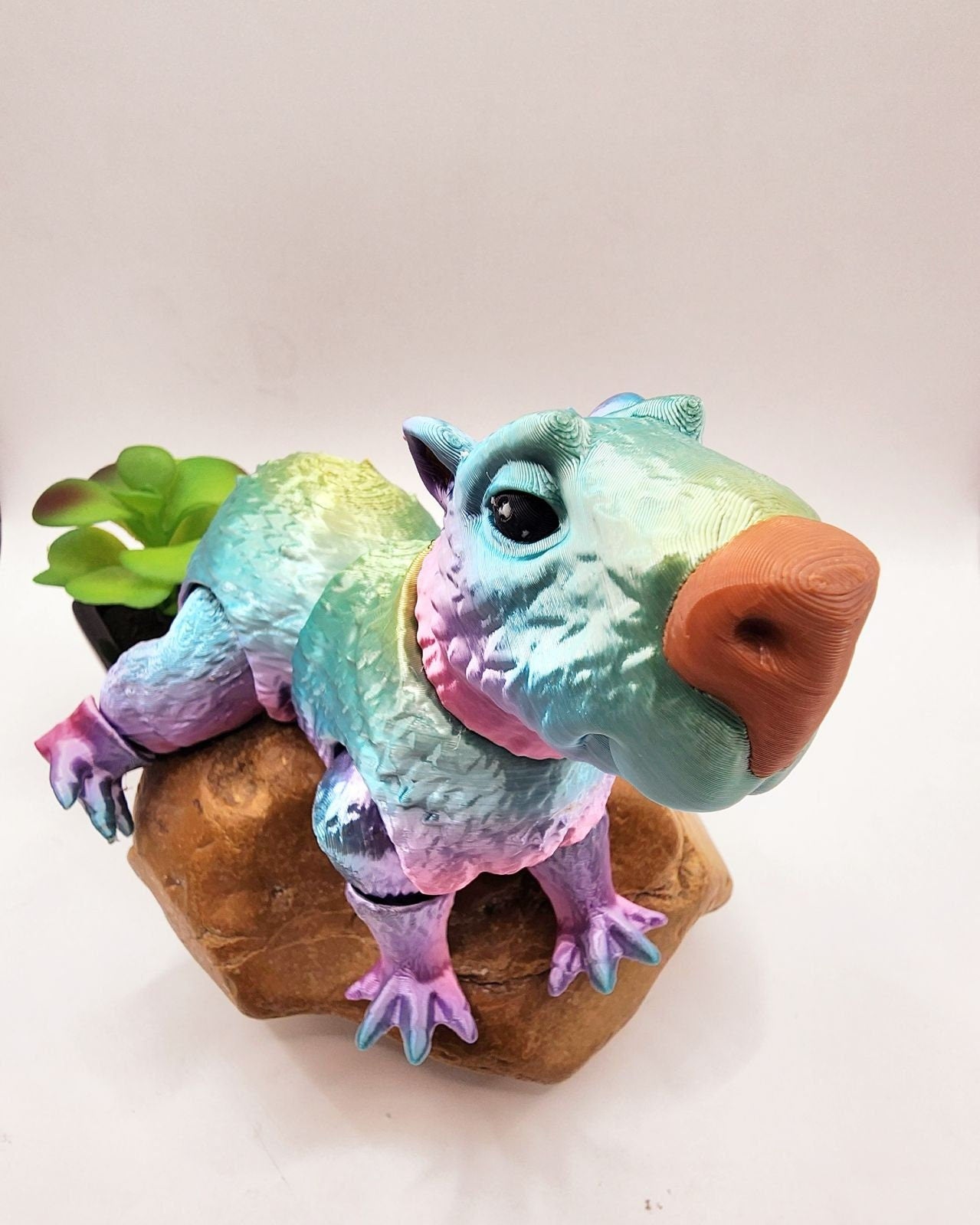 Capybara 3D multicolor printed articulate fidget toy.