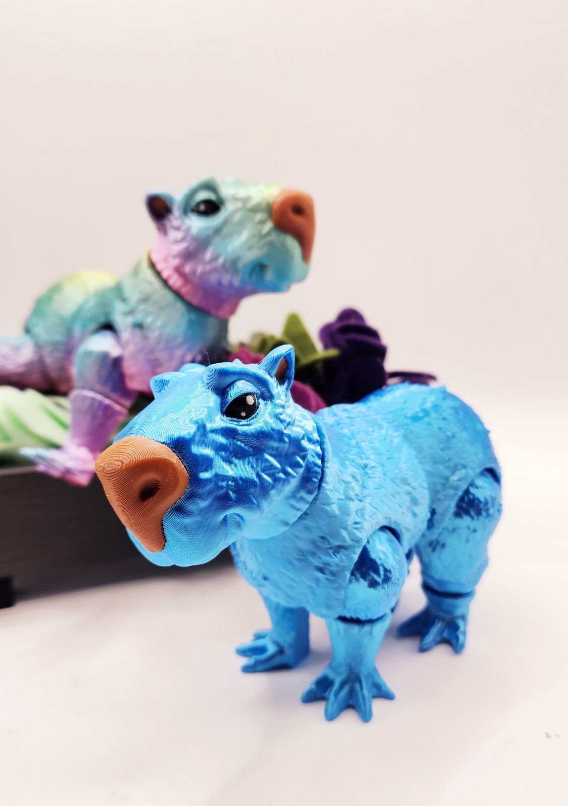 Capybara 3D multicolor printed articulate fidget toy.