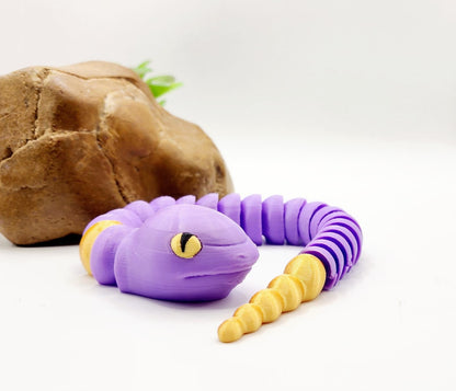 3D multicolor Pokemon Ekans articulated fidget sensory toy.