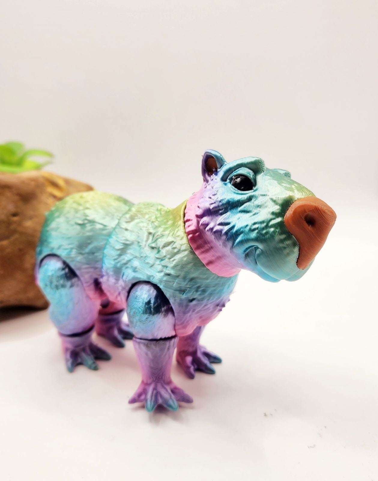 Capybara 3D multicolor printed articulate fidget toy.