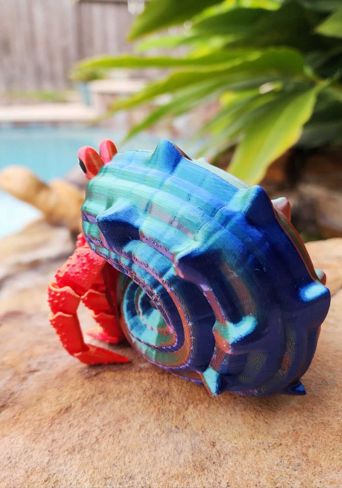 Articulated hermit crab with removable shell. Fidget toy, sensory toy.