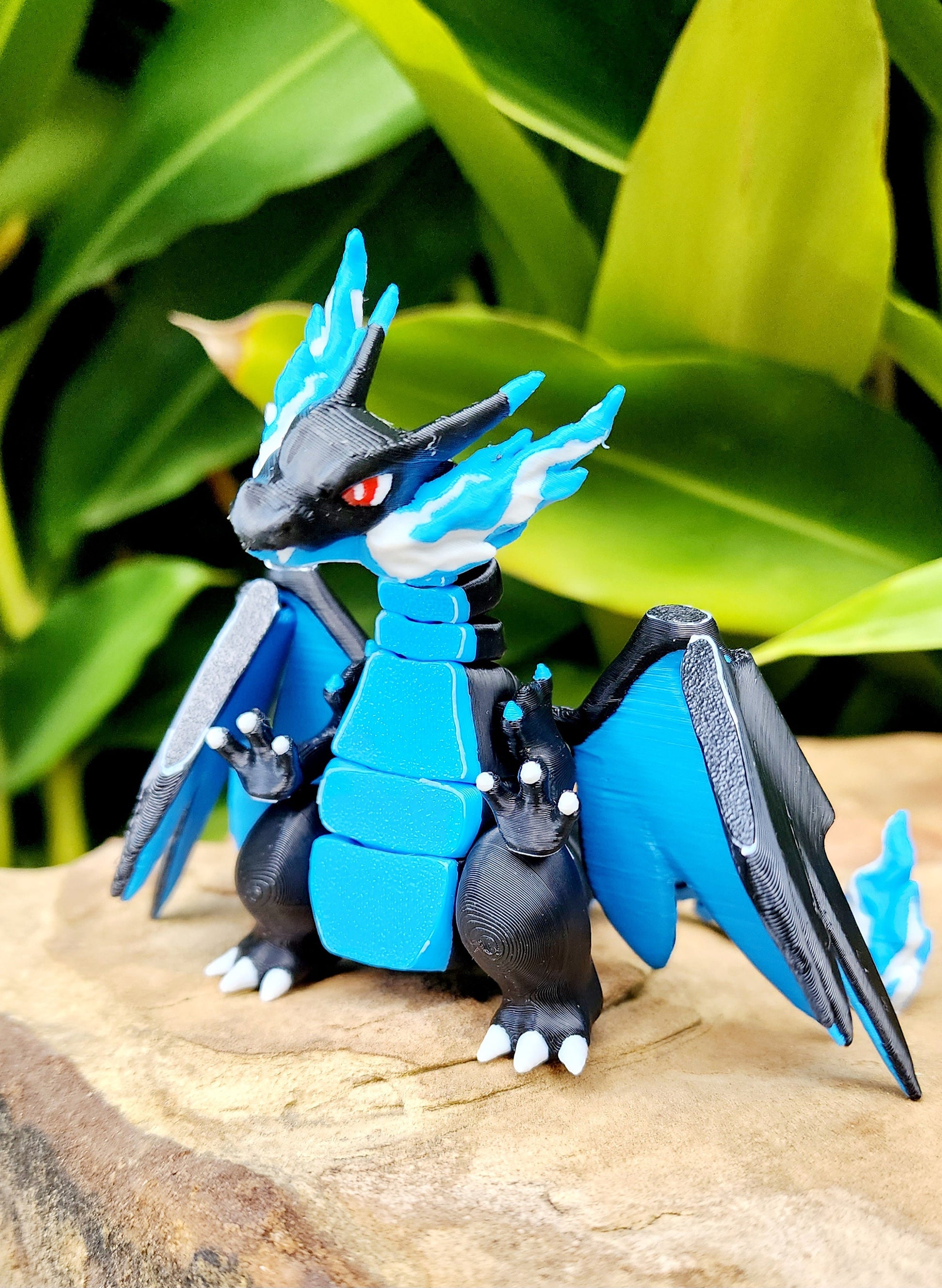 3D printed Mega Charizard X, articulated flexi fidget toy, sensory toy, desktop toy.