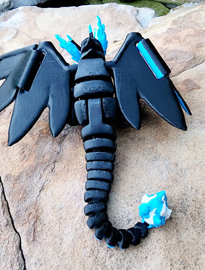 3D printed Mega Charizard X, articulated flexi fidget toy, sensory toy, desktop toy.