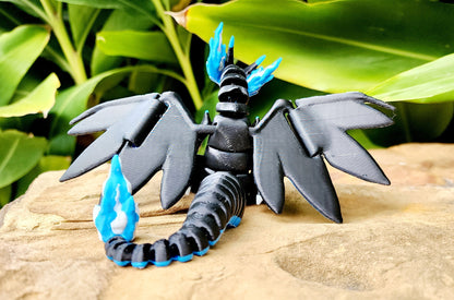 3D printed Mega Charizard X, articulated flexi fidget toy, sensory toy, desktop toy.