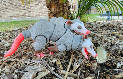 3D printer cute Opossum articulated fidget toy.