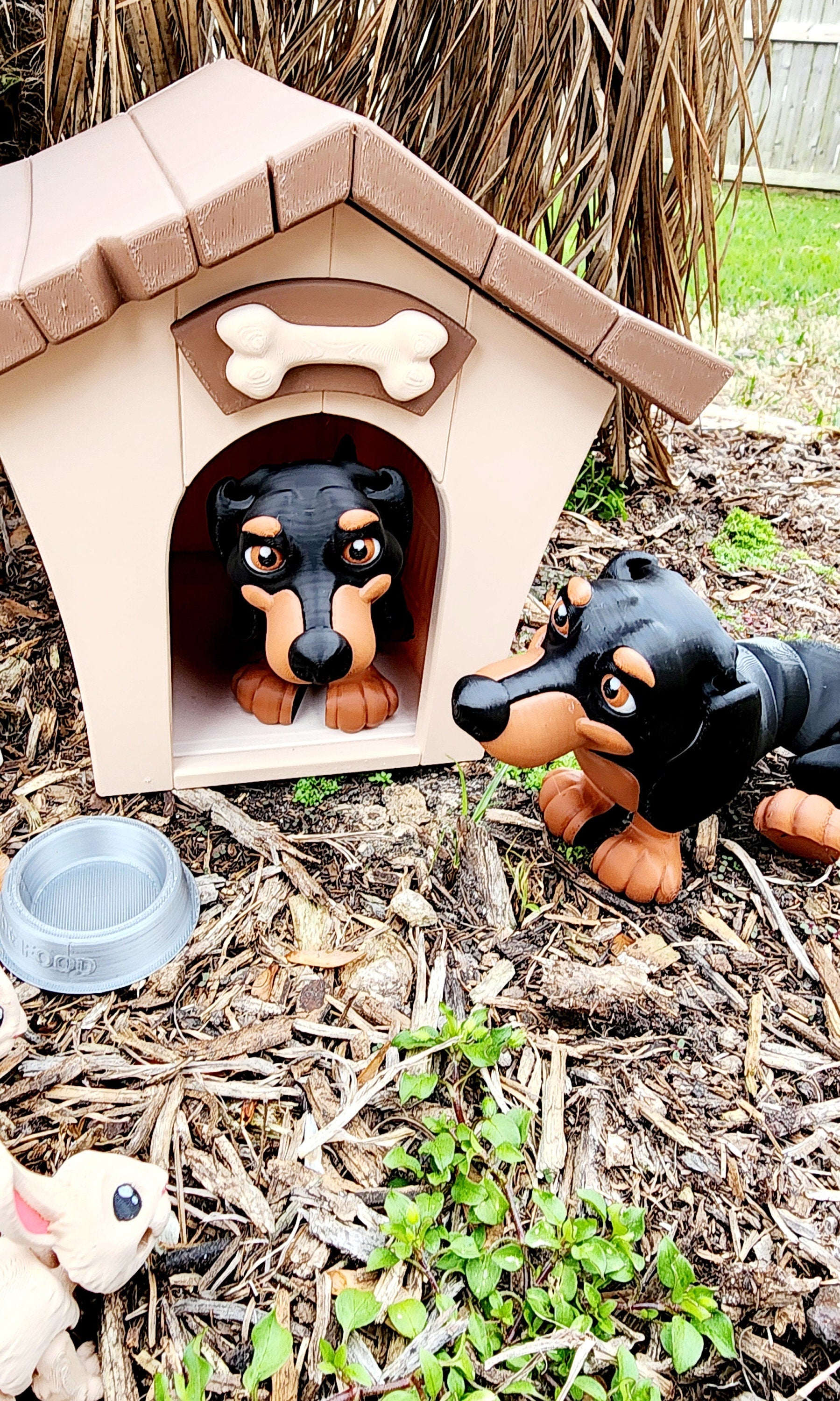 3D printed articulate Dachshund with a Kennel, and bowl. Fidget, sensory toy.