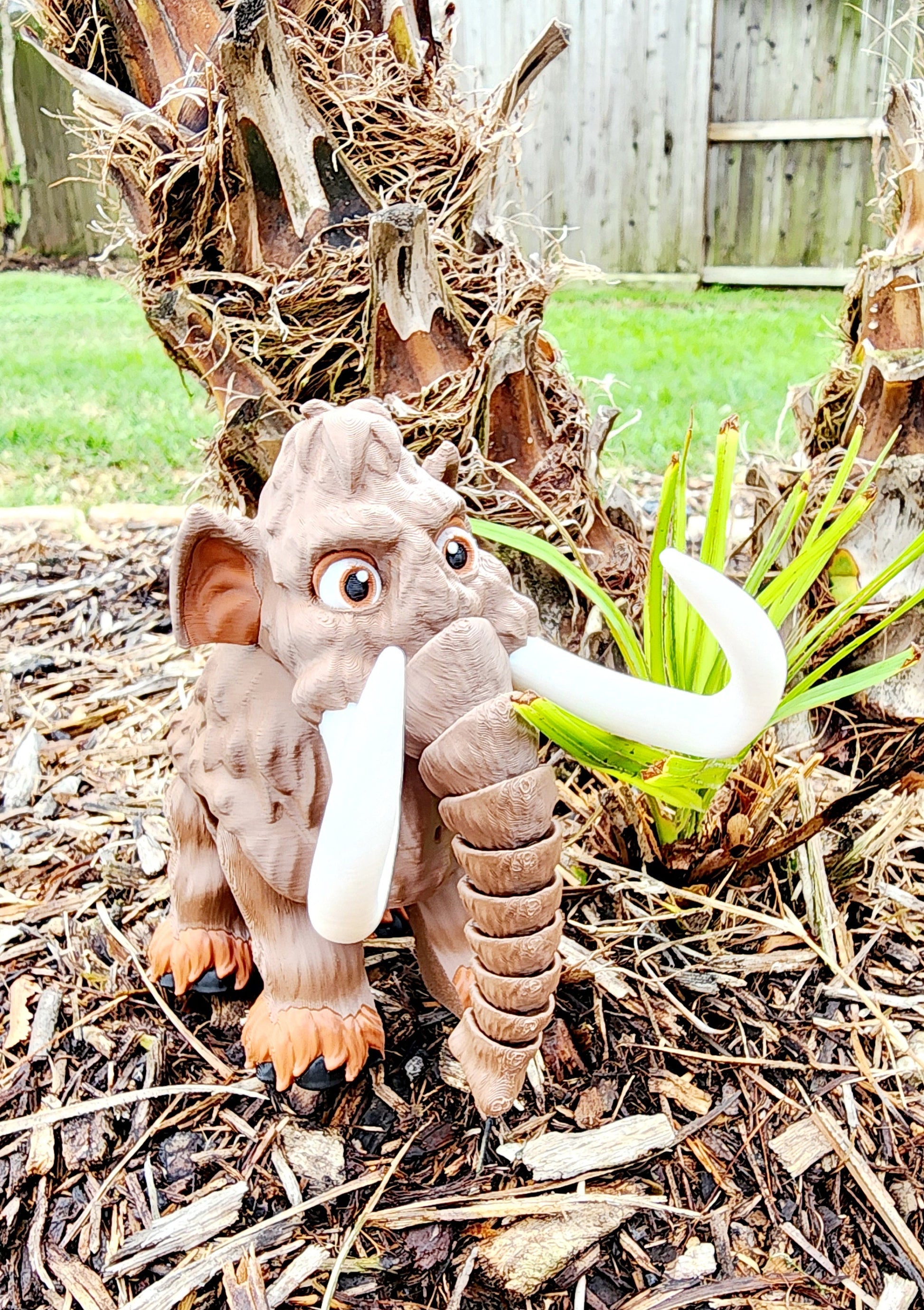 3D printed articulated Mammoth fidget toy.