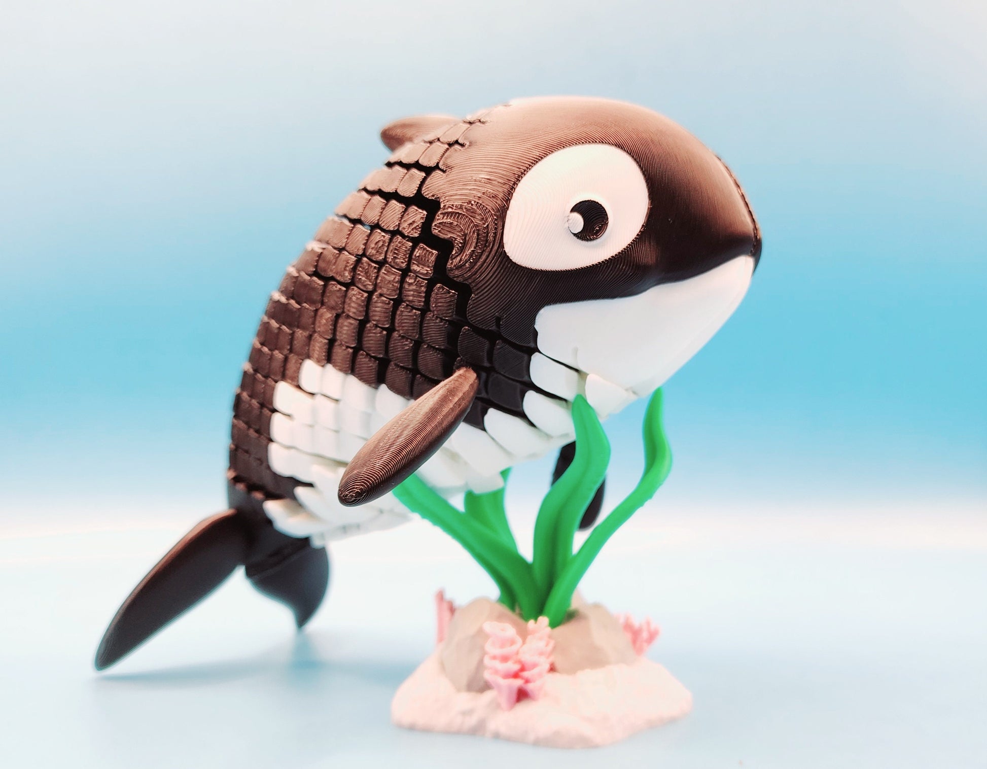 3D printed articulated Orca Whale fidget sensory toy.