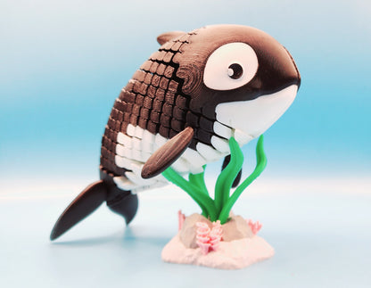 3D printed articulated Orca Whale fidget sensory toy.