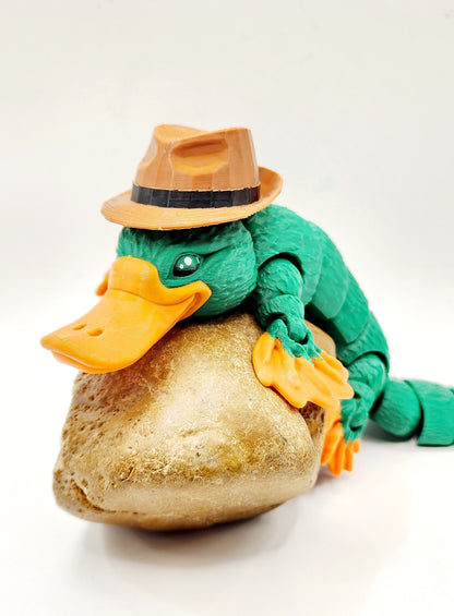 3D printed articulated Platypus fidget sensory toy. Desk Toy with a removable hat.