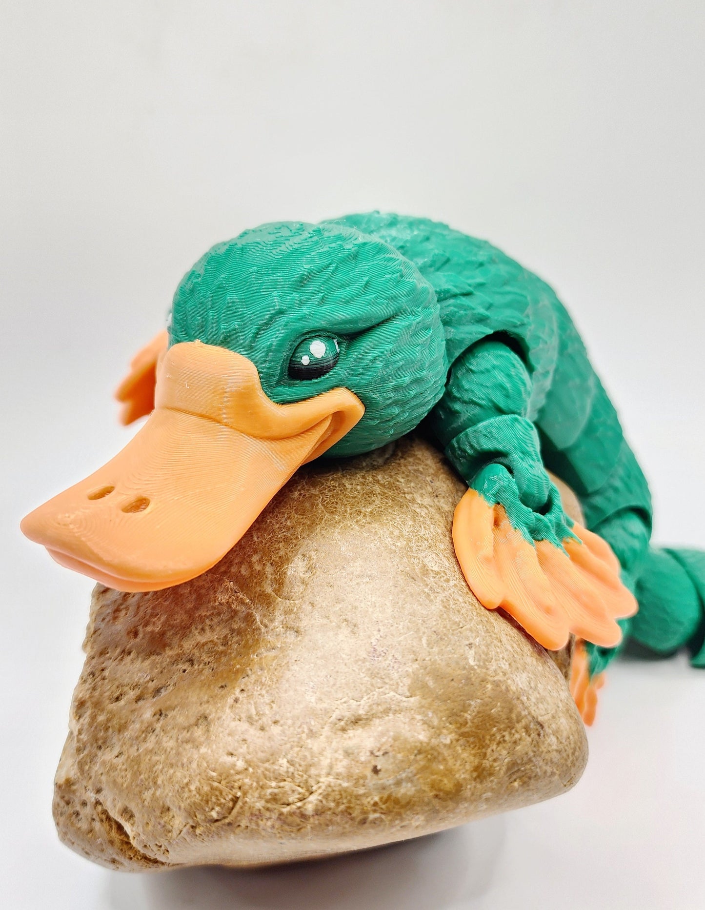 3D printed articulated Platypus fidget sensory toy. Desk Toy with a removable hat.