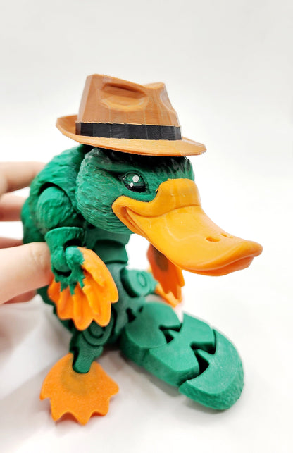 3D printed articulated Platypus fidget sensory toy. Desk Toy with a removable hat.