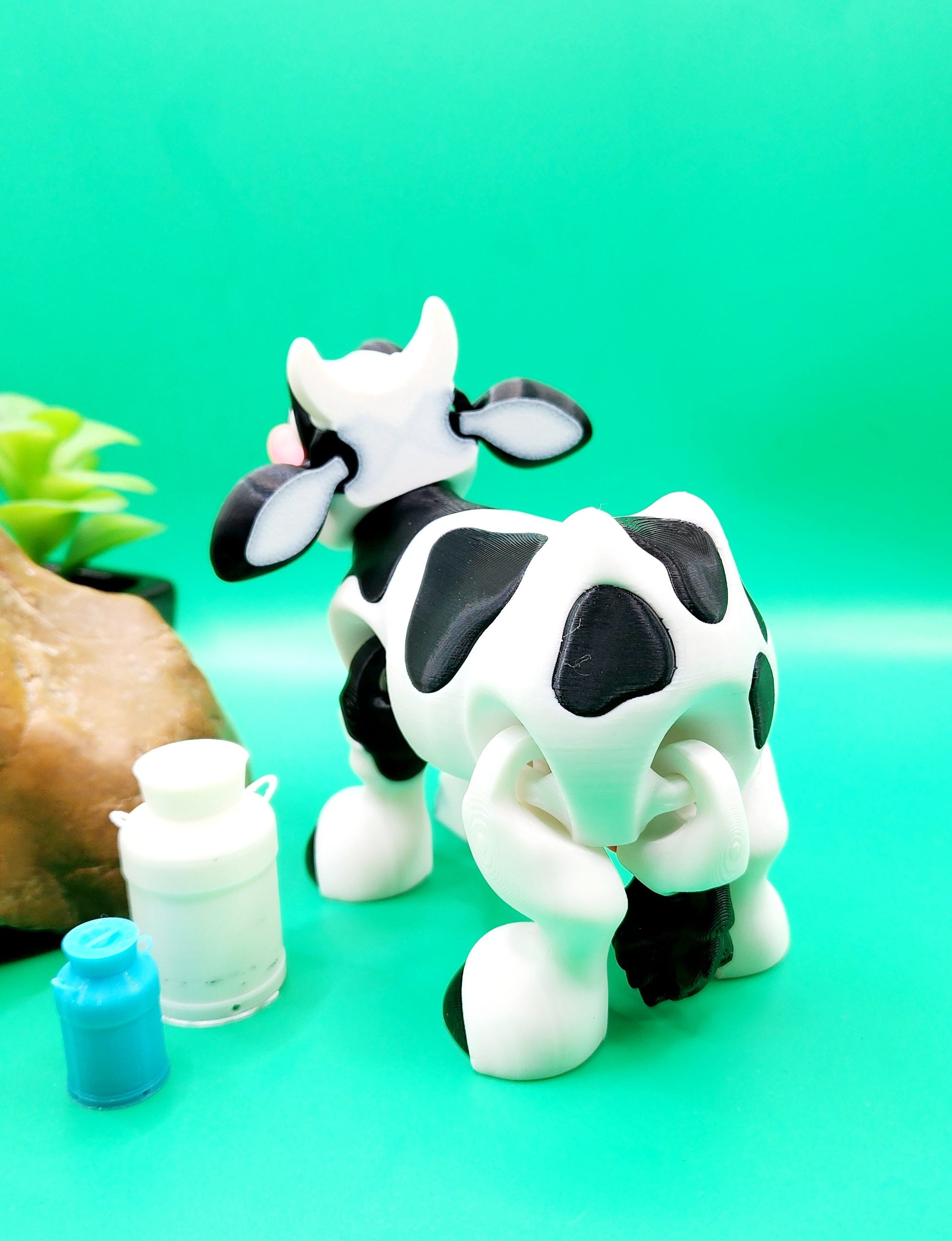 3D printed Milk cow articulated fidget toy. Sensory toy, desk toy.