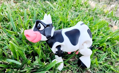 3D printed Milk cow articulated fidget toy. Sensory toy, desk toy.