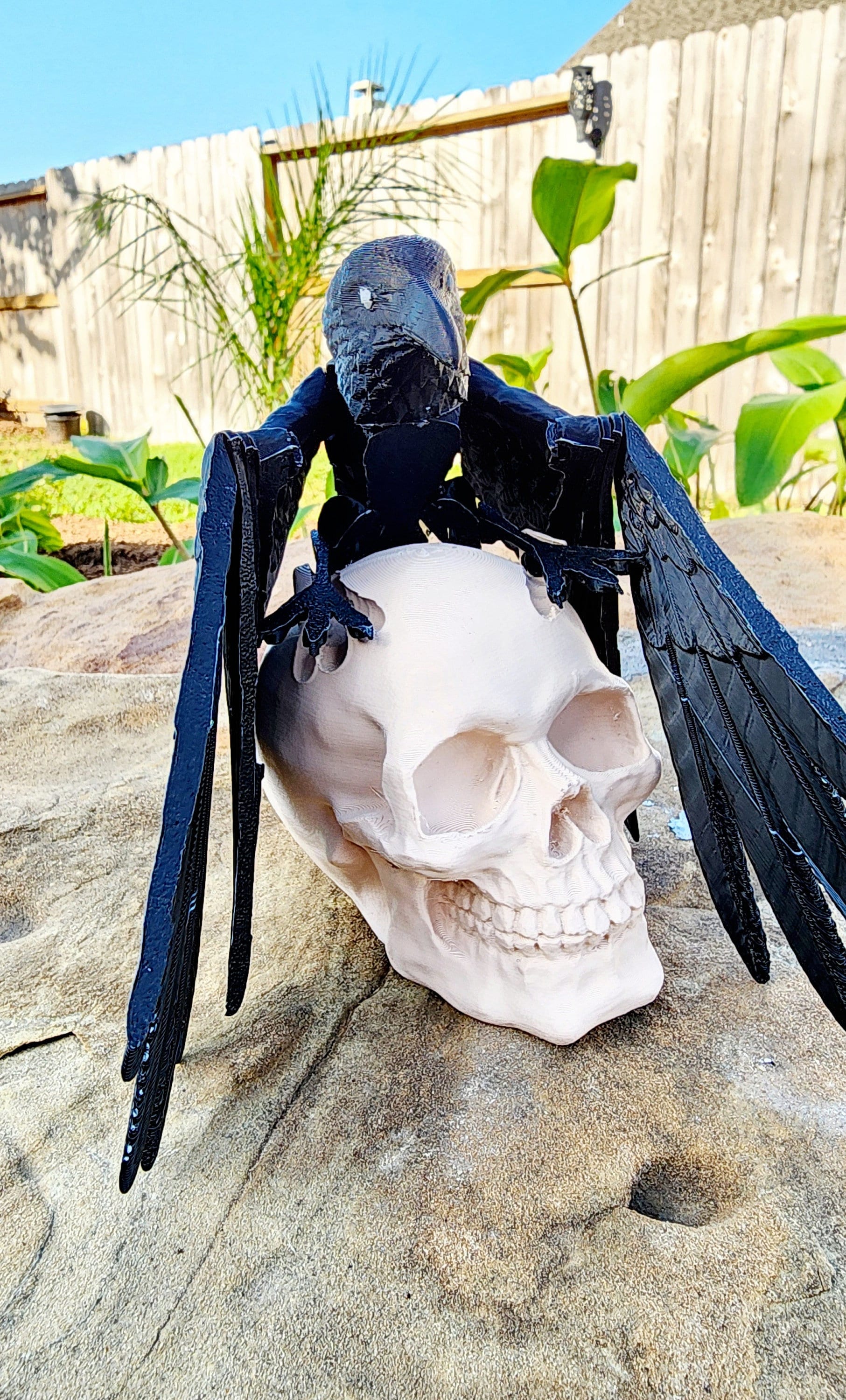 3D printed articulated Raven with articulated wings, fidget, sensory toy with optional skull base.