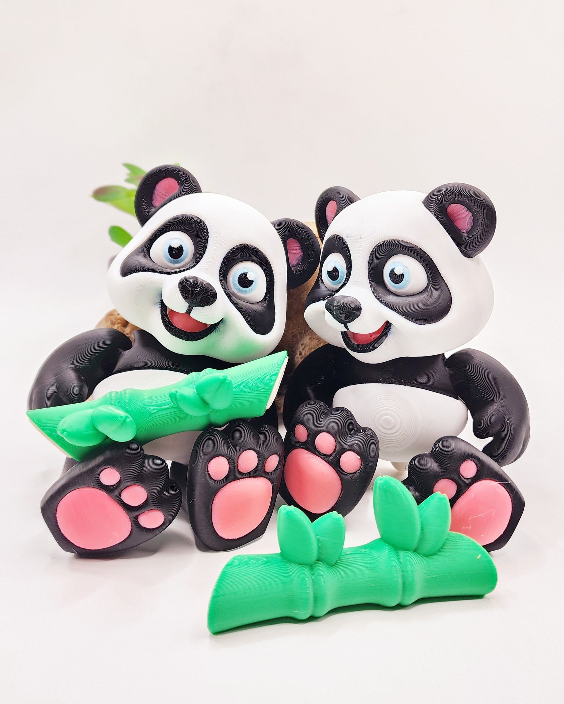 3D Printed articulated flexi baby Panda with bamboo fidget desk toy.