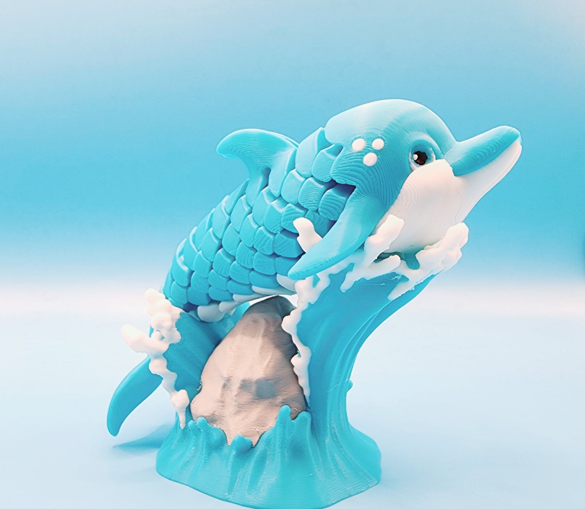 3D printed articulated Dolphin desk toy, figet, sensory toy.