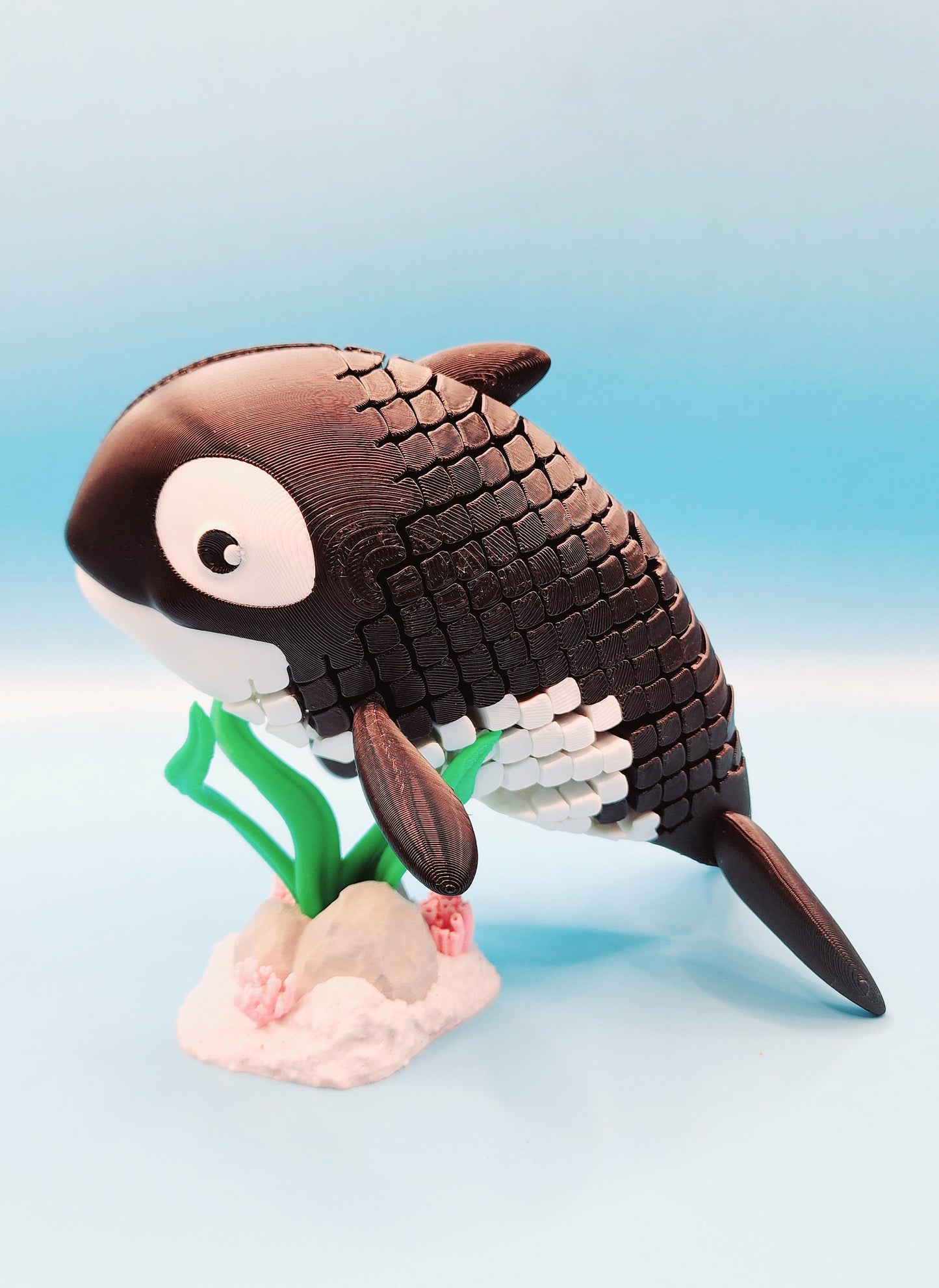 3D printed articulated Orca Whale fidget sensory toy.