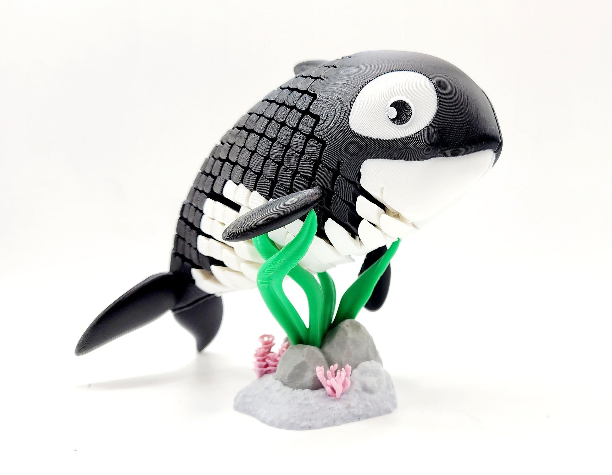 3D printed articulated Orca Whale fidget sensory toy.