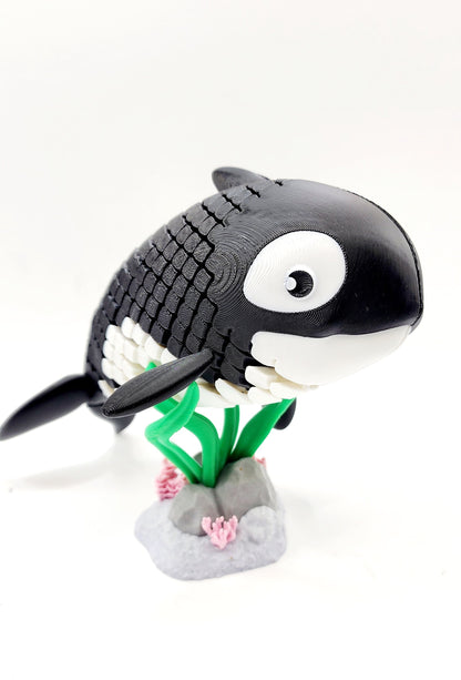 3D printed articulated Orca Whale fidget sensory toy.