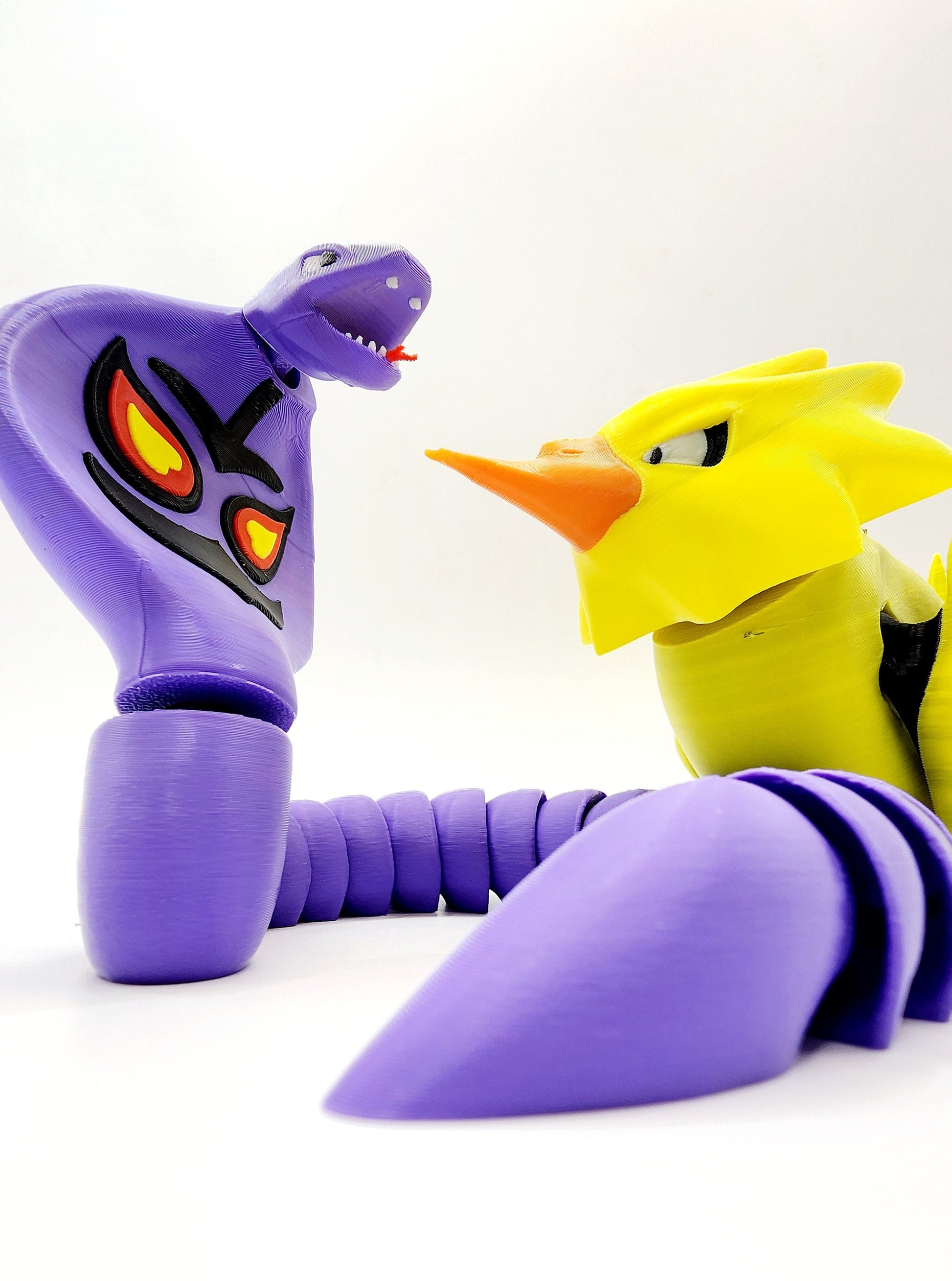 3D printed pokemon Arbok. Articulated fidget, sensory, desk toy.