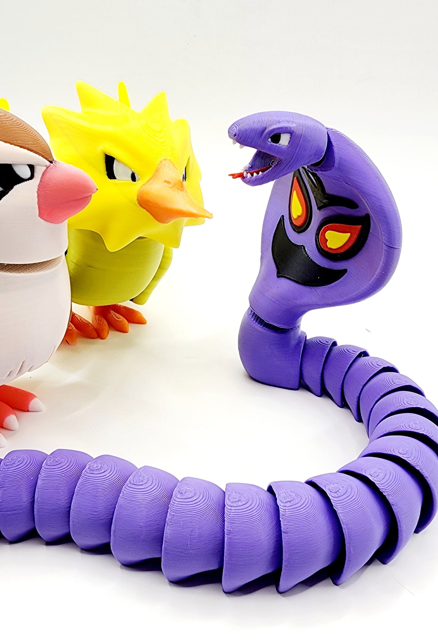 3D printed pokemon Arbok. Articulated fidget, sensory, desk toy.